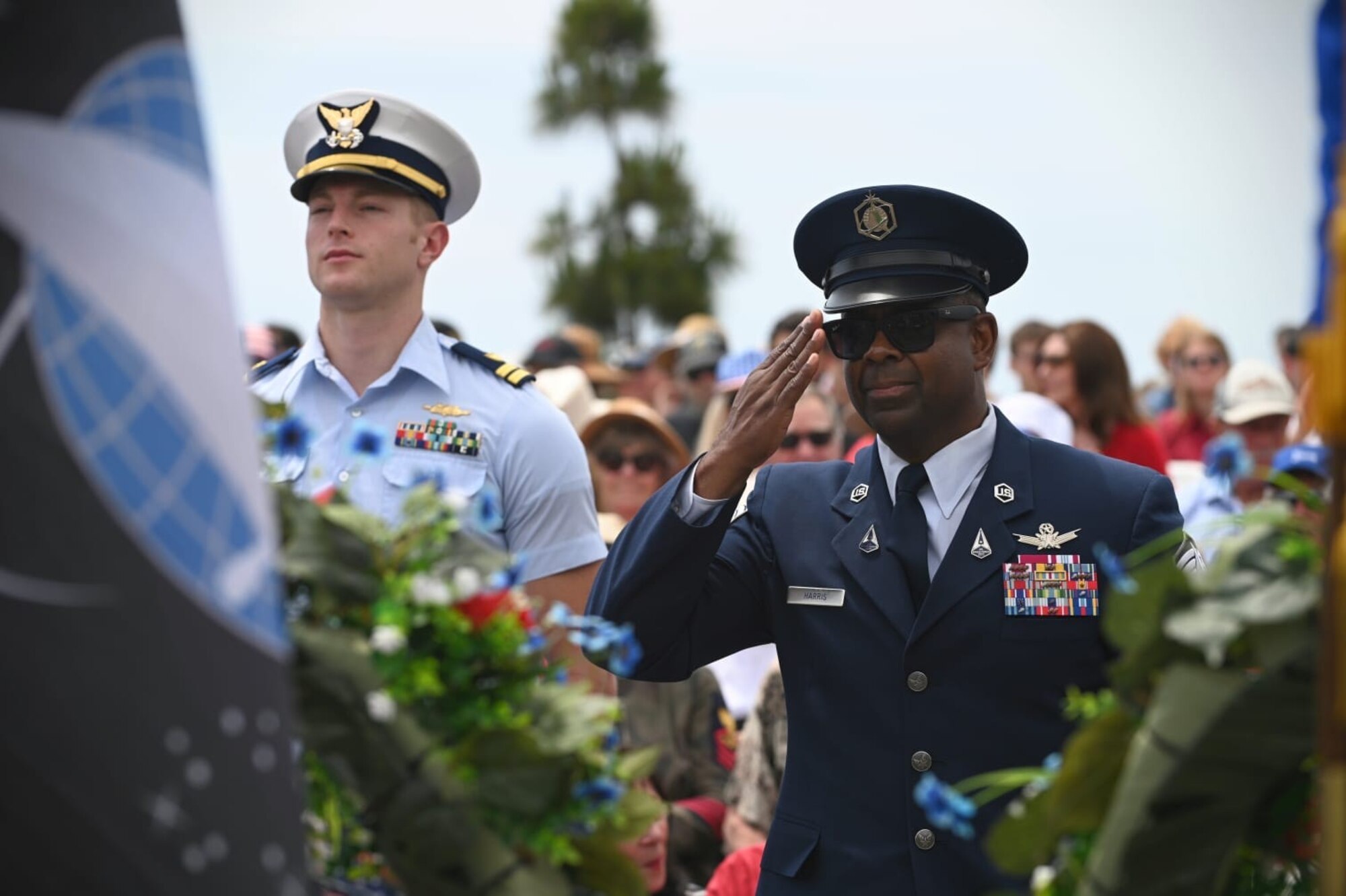 U.S. Space Force Chief Master Sgt. Johnny Harris, Space Launch Delta 30 senior enlisted leader, salutes a ceremonial USSF wreath lain in honor and commemoration of Memorial Day at the Santa Barbara Cemetery in Santa Barbara, Calif., May 26, 2025. (U.S. Space Force photo by Tech. Sgt. Draeke Layman)