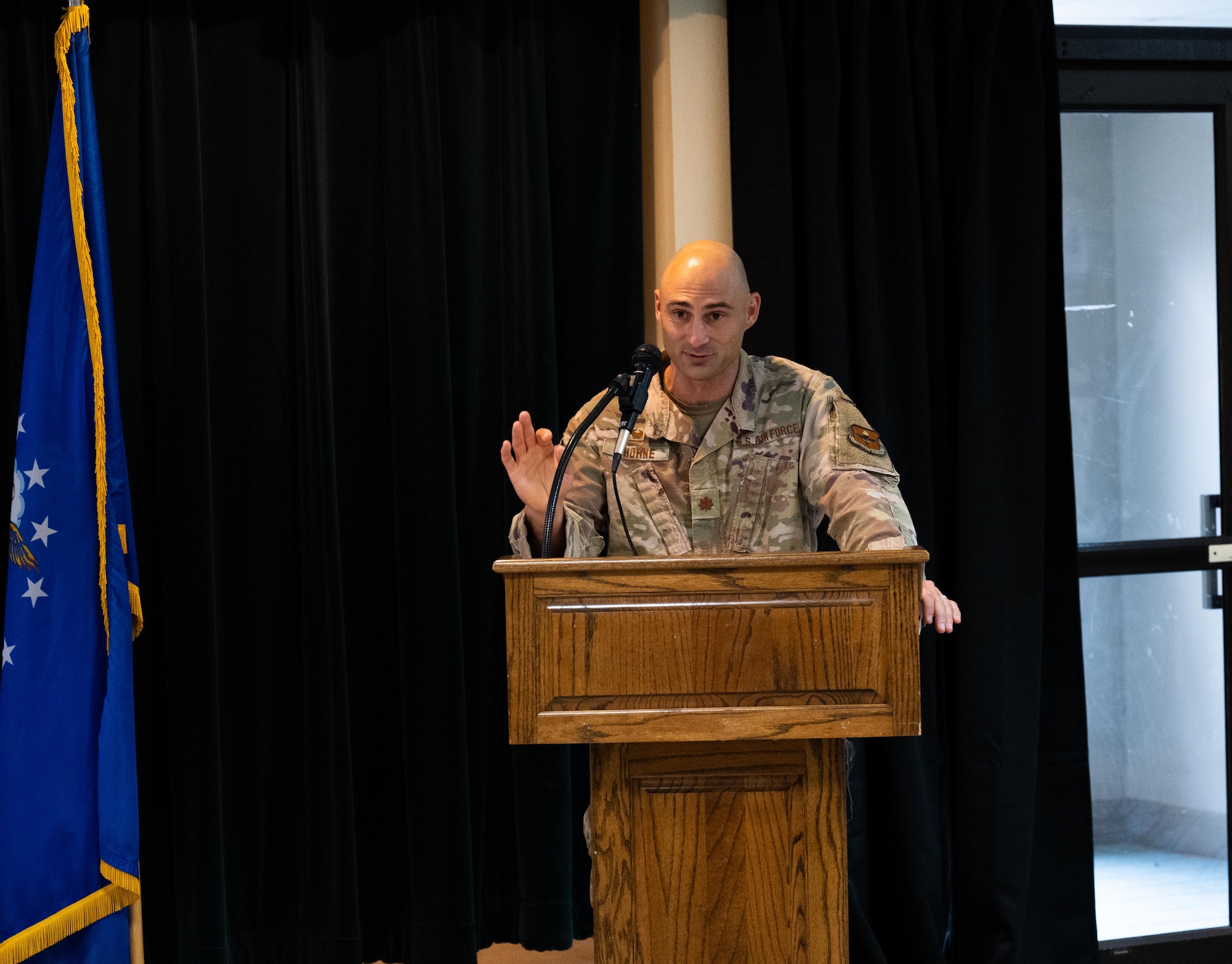 U.S. Air Force Maj. Matthew Thorne, 47th Contracting Squadron commander, delivers opening remarks during the Small Business Industry Day at Laughlin Air Force Base, Texas, May 21, 2025. The event connected base leadership with local  and regional business representatives to foster partnerships and promote opportunities within the defense contracting space. (U.S. Air Force photo by Airman 1st Class Harrison Sullivan)