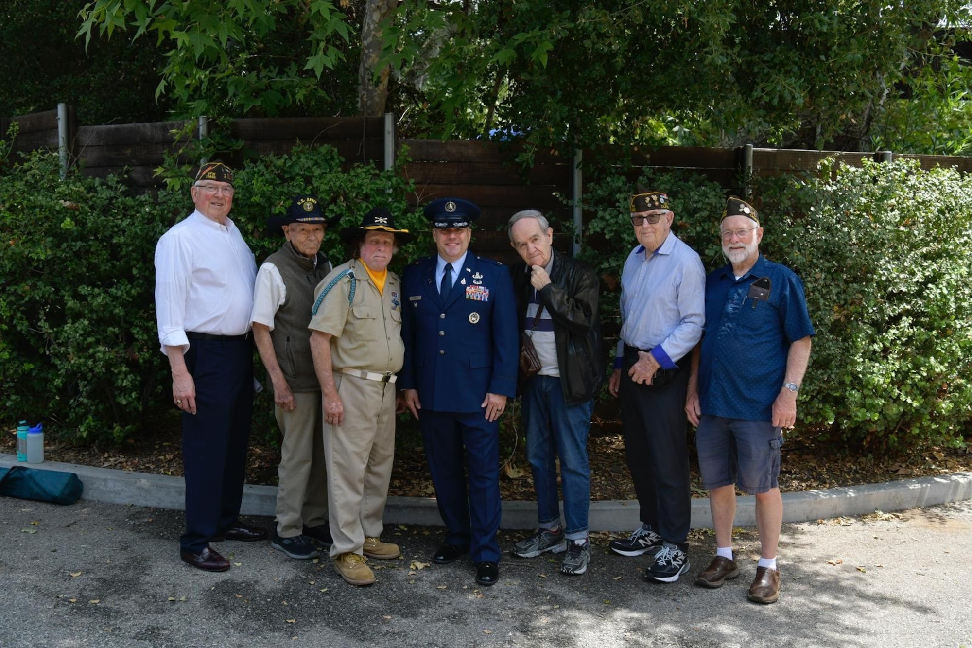 U.S. Space Force Col. Dorian Hatcher, Space Launch Delta 30 deputy commander, poses for a photo with members of Veterans of Foreign Wars Post 11461 in Ojai, Calif., May 26, 2025. During his visit, Hatcher connected with local community members and veterans before delivering a speech highlighting the importance of honoring the men and women who paid the ultimate sacrifice in service and defense of the United States. (U.S. Space Force photo by 2nd Lt. Andrew Taller)