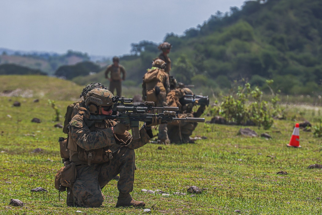 U.S. Marines with 3d Littoral Combat Team, 3d Marine Littoral Regiment, 3d Marine Division, engage targets during a high explosive in support of Exercise KAMANDAG 9 at Colonel Ernesto Rabina Air Base, Philippines, May 22, 2025.