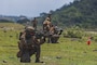 U.S. Marines with 3d Littoral Combat Team, 3d Marine Littoral Regiment, 3d Marine Division, engage targets during a high explosive in support of Exercise KAMANDAG 9 at Colonel Ernesto Rabina Air Base, Philippines, May 22, 2025.