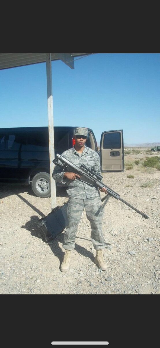 Then Sgt. Joshua Willis holding a rifle during a training event. (Courtesy photo)
