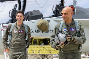 Lt. Gen. Brian Robinson, Air Education and Training Command commander, walks away from a T-7A Red Hawk, following a successful flight with instructor Lt. Col. Jonathan Aronoff, 416th Flight Test Squadron, at Edwards Air Force Base, Calif, April 30. Robinson became the first non-test pilot to fly the T-7A. His flight represented a significant demonstration of progress and commitment to modernizing pilot training. (U.S. Air Force photo by Jennifer Healy)