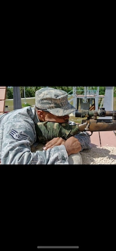 Then Sgt. Joshua Willis holding a rifle during a training event. (Courtesy photo)
