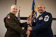 U.S. Air Force Chief Master Sgt. Steven Best, right, accepts the guidon for Joint Force Headquarters—Kentucky/Air from U.S. Army Maj. Gen. Haldane Lamberton, adjutant general of the Kentucky National Guard,  signifying Best’s assumption of the role of state command chief during a ceremony at the Kentucky Air National Guard Base in Louisville, Ky., April 13, 2025. Best replaces U.S. Air Force Chief Master Sgt. James Tongate, who is retiring. (U.S. Air National Guard photo by Master Sgt. Joshua Horton)