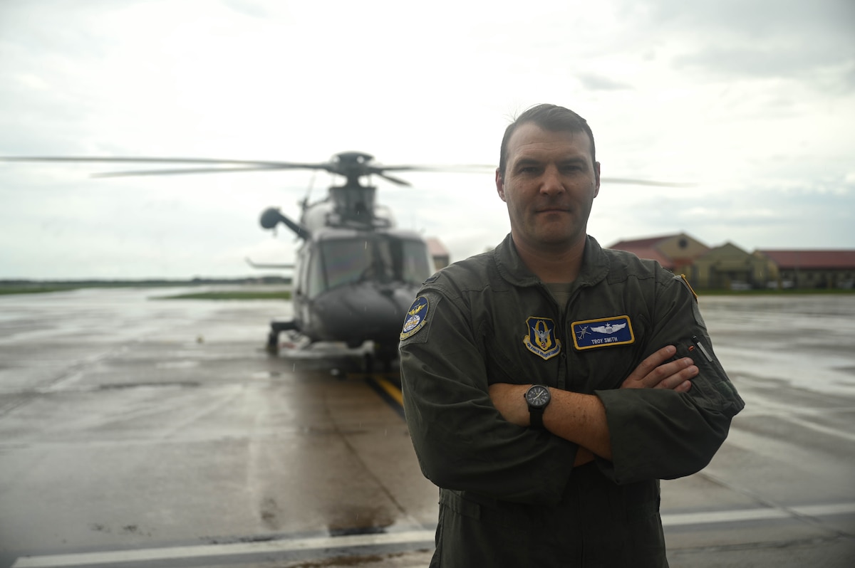 a person poses for a photo