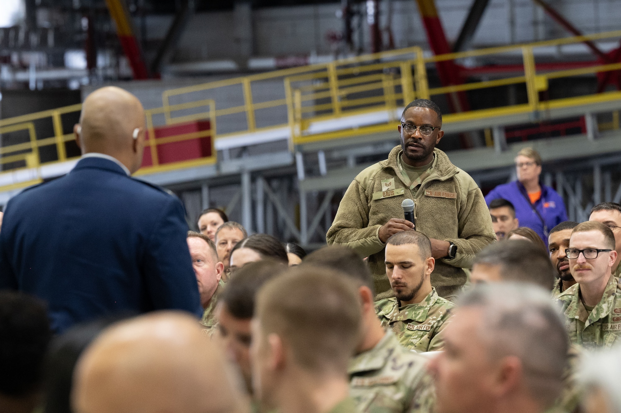 Col. Melchizedek Martinez answers a question from a member of the audience as part of his resiliency speech during the 932nd AW Resilience Quest event May 3, 2025, Scott Air Force Base, Illinois. Martinez suffered the tragic loss of his wife during a terrorist attack in Brussels Airport, which inspired him to teach Airmen and civilians how to survive after trauma. (U.S. Air Force photo by Senior Airman Benjamin Cowles)