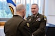 The ceremony was presided over by Lieutenant General Robert M. Collins