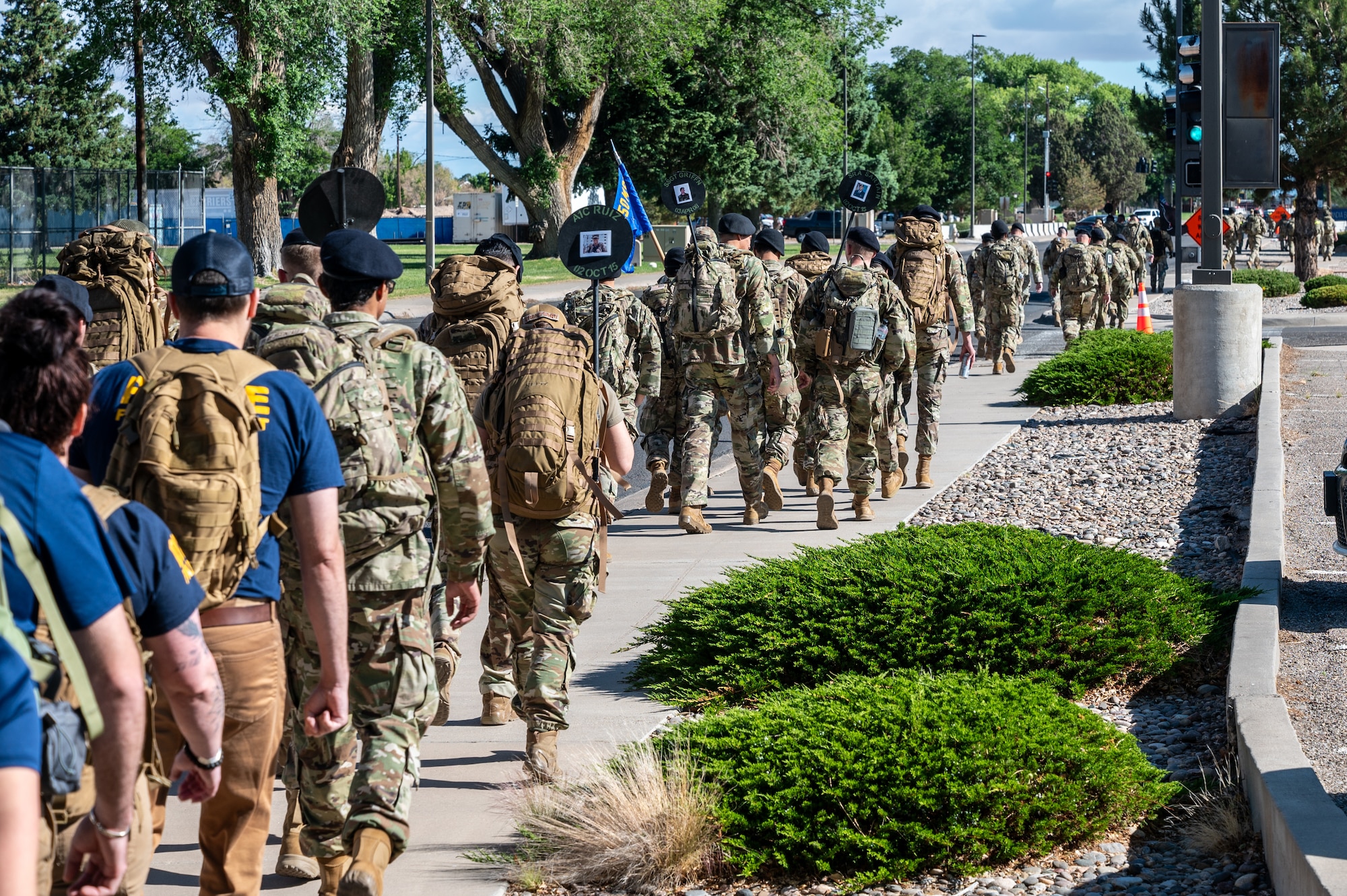 Airmen participate in the Police Week Ruck March at Kirtland Air Force Base, N.M., May 19. The march honored fallen law enforcement officers and recognized the sacrifices of Security Forces members across the Department of the Air Force. Police Week events are held annually to commemorate National Police Week and foster esprit de corps within the defender community. (U.S. Air Force photo by Airman 1st Class Donnell Schroeter)