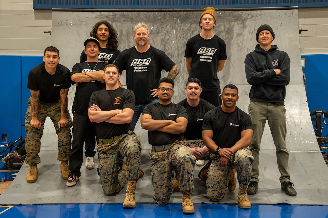 U.S. Marines with Recruiting Sub-Station Manteca, Recruiting Station Sacramento, pose for a photograph with Action Sports Association team members during an ASA No Hate Tour event at Mountain House High School in Mountain House, California, March 28, 2025. The ASA No Hate Tour, now in its 25th year, is an educational program that uses the energy and excitement of action sports to deliver critical bullying prevention tools, techniques, and information to students. (U.S. Marine Corps photo by Lance Cpl. Avery Wayland)