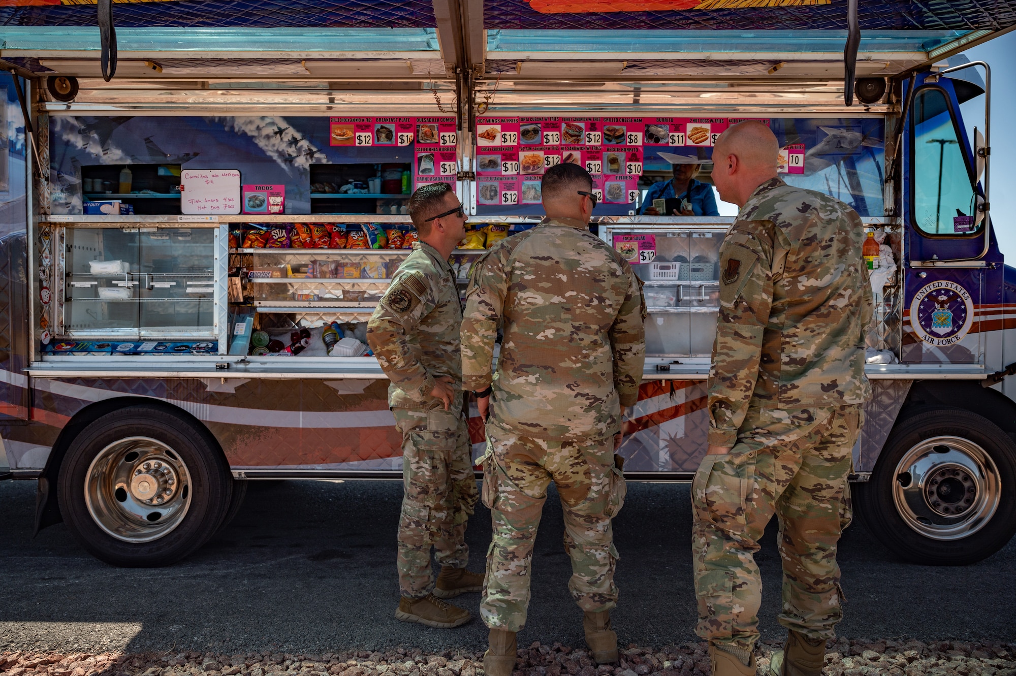 Airmen stand by food truck