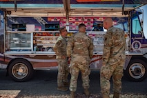 Airmen stand by food truck