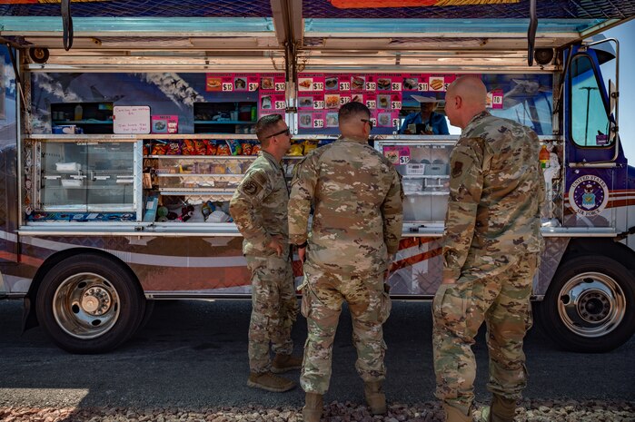 Airmen stand by food truck