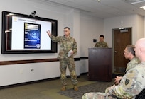 Chief Warrant Officer 4 Jerry Schmaljohann provides opening comments during a Healthcare Technology Management Week summit, hosted by U.S. Army Medical Logistics Command May 21-22 at Fort Detrick, Maryland.