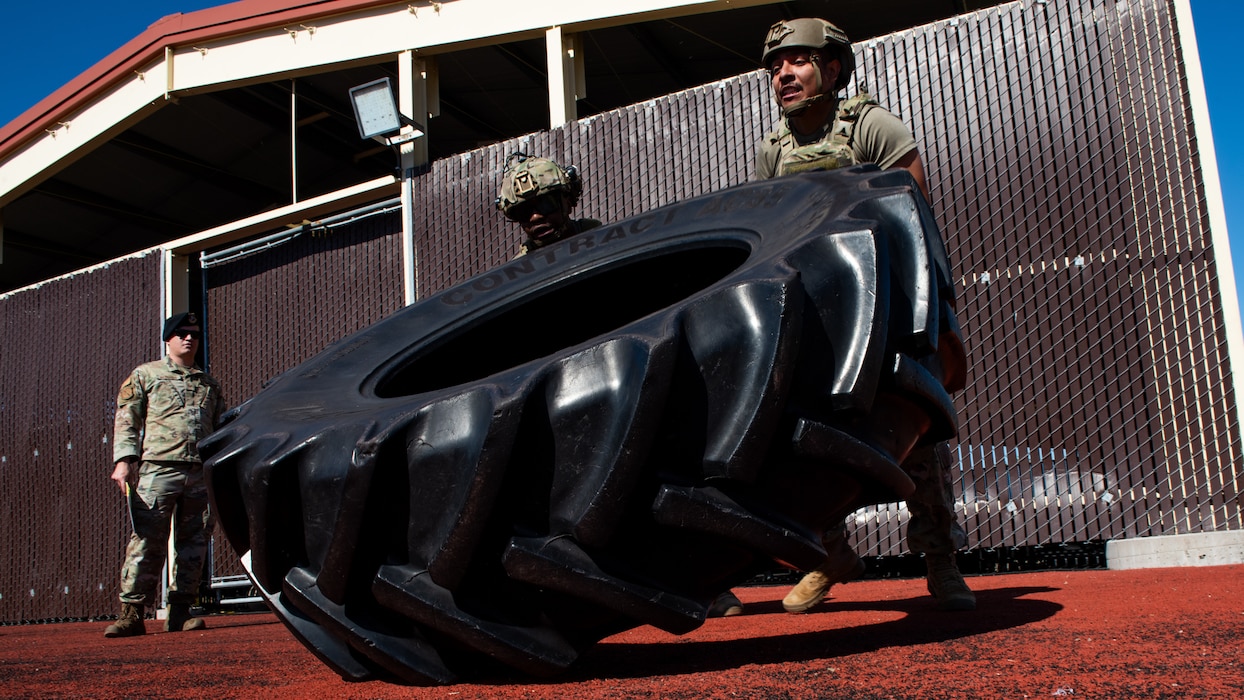 Airmen flip tire
