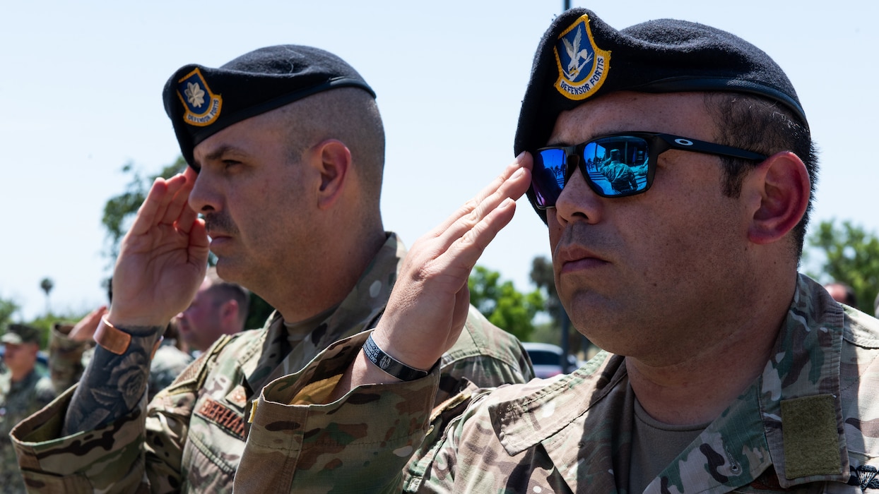 Airmen render salute