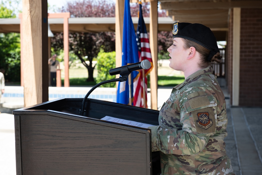 Airman sings the national anthem