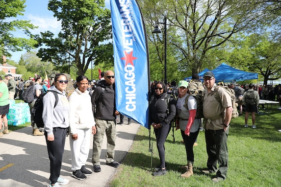 From left to right, Roxanne Zadlo, Sgt. First Class Dora Uwudia, Master Sgt. Laroy Warren, Staff Sgt. Raschelle Barnes, Sgt. 1st Class Grainne Battell and her husband, Andrew Gale, pause for a photo at the 11th annual Chicago Veteran’s Ruck March, May 23, 2025.