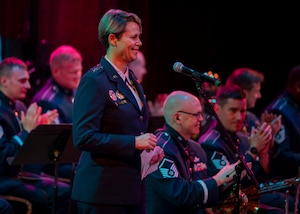 U.S. Air Force Lt. Gen. Rebecca Sonkiss, Air Mobility Command deputy commander, gives opening remarks at the Airmen of Note Spring Tour concert at The Sheldon Concert Hall in St. Louis, Missouri, April 30, 2025. Sonkiss shared her love of music with the crowd and admired the band's talent. (U.S. Air Force photo by Staff Sgt. Ethan Sherwood)