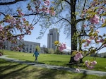 Photo of person walking in front of Building 1 of WRNMMC