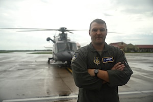 a person poses for a photo