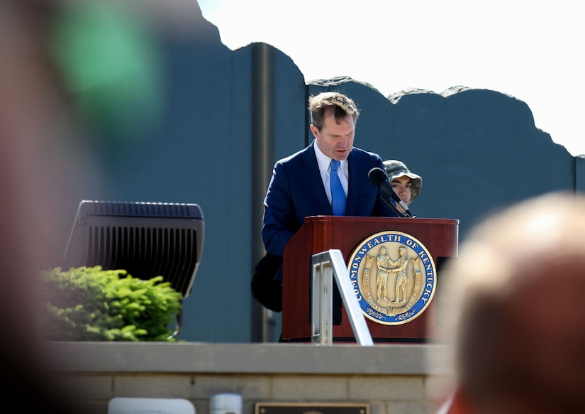 Kentucky Governor Andy Beshear delivers remarks during the Memorial Day remembrance ceremony held at the Kentucky National Guard Memorial at Boone National Guard Center in Frankfort, Kentucky, May 26, 2025.