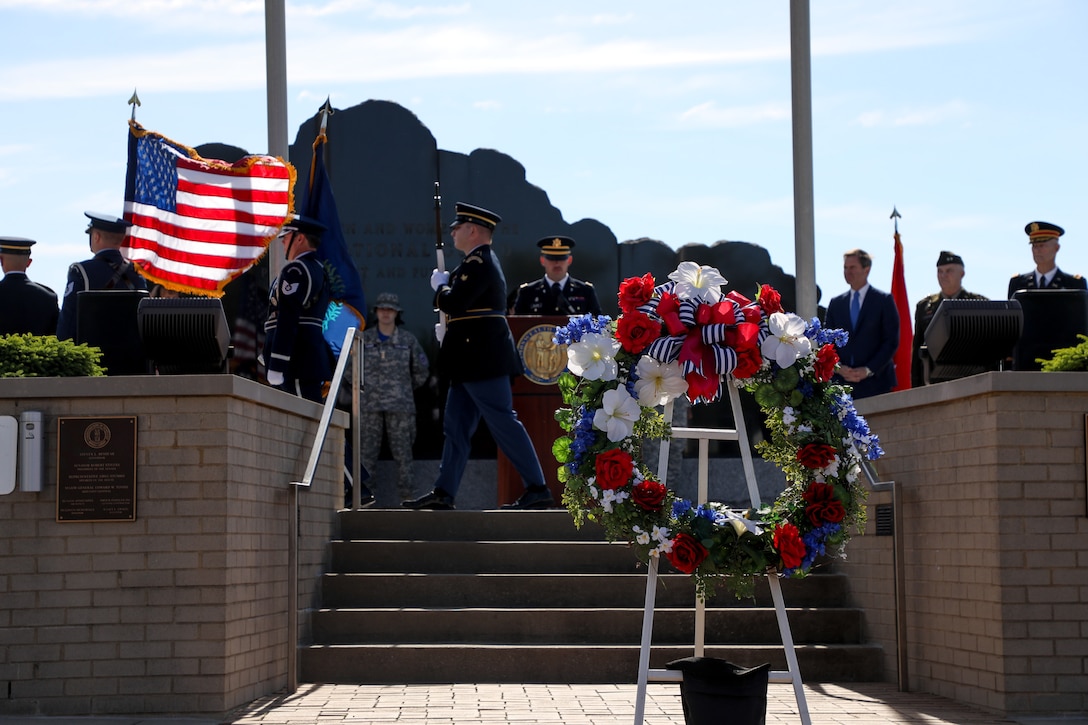 Soldiers with the Kentucky National Guard Color Guard present the colors during the Memorial Day remembrance ceremony held at the Kentucky National Guard Memorial at Boone National Guard Center in Frankfort, Kentucky, May 26, 2025.