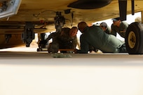 A Moroccan pilot with the Royal Moroccan Armed Forces explains the process for using the static discharge wand to U.S. Army Sgt. Dylan Dibernardo, a wheeled vehicle mechanic assigned to 3rd Battalion, 197th Field Artillery Regiment, New Hampshire Army National Guard, to ensure the aircraft is properly grounded for safe sling load operations at African Lion 2025 (AL25), May 17, 2025, in Tan-Tan, Morocco. AL25, the largest annual military exercise in Africa, brings together over 50 nations, including seven NATO allies and 10,000 troops to conduct realistic, dynamic and collaborative training in an austere environment that intersects multiple geographic and functional combatant commands. Led by U.S. Army Southern European Task Force, Africa (SETAF-AF,) on behalf of the U.S. Africa Command, AL25 takes place from April 14 to May 23, 2025, across Ghana, Morocco, Senegal, and Tunisia This large-scale exercise will enhance our ability to work together in complex, multi-domain operations - preparing forces to deploy, fight, and win.