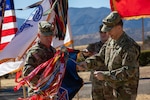 Soldiers uncasing unit colors