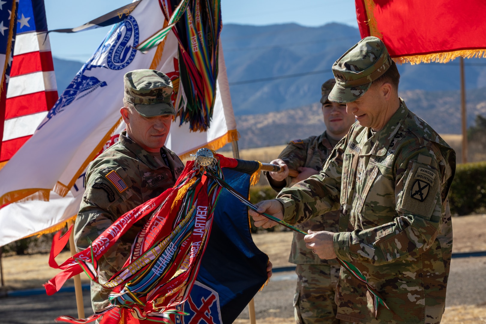 Soldiers uncasing unit colors