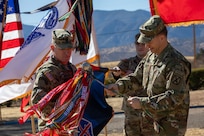 Soldiers uncasing unit colors