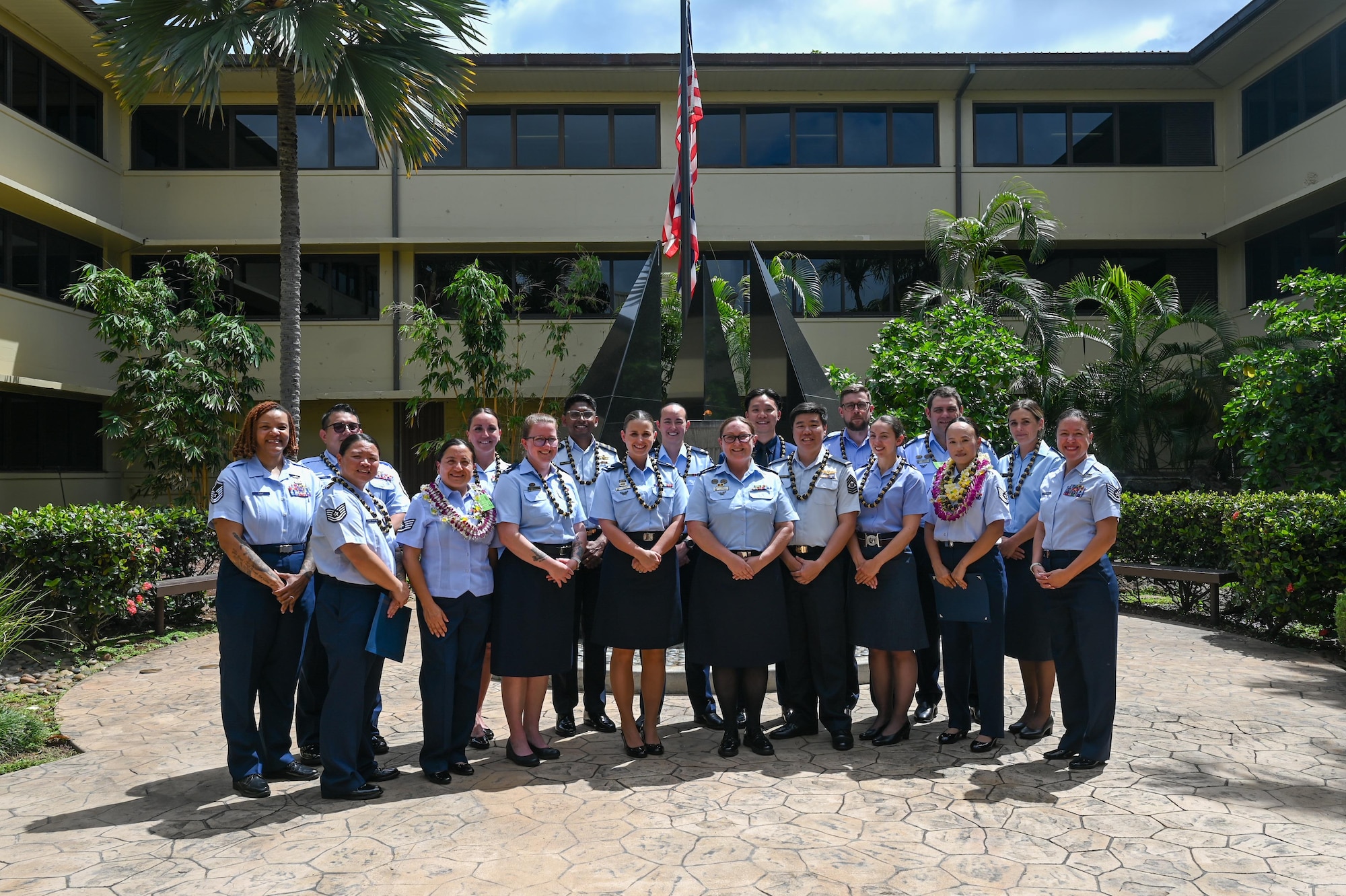 U.S. Air Force and multinational Air Forces service members graduating from the Inter-Pacific Junior Enlisted Leader Forum (IPJELF) pose for a group photo at Joint Base Pearl Harbor-Hickam, Hawaii, May 19, 2025. The IPJELF participants shared experiences and worked to form bonds to strengthen international partnerships and arm them with new connections and experiences to help the success of future partnered missions. (U.S. Air Force photo by Senior Airman Melody Bordeaux)