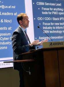 Gordon Kordyak, deputy for the Department of the Air Force Integrating Program Executive Office for Command, Control, Communications and Battle Management (DAF PEO C3BM), delivers a briefing on the DAF BATTLE NETWORK to C3BM commercial sector partners and stakeholders during the May 9 Industry Day, held in Chantilly, Virginia.