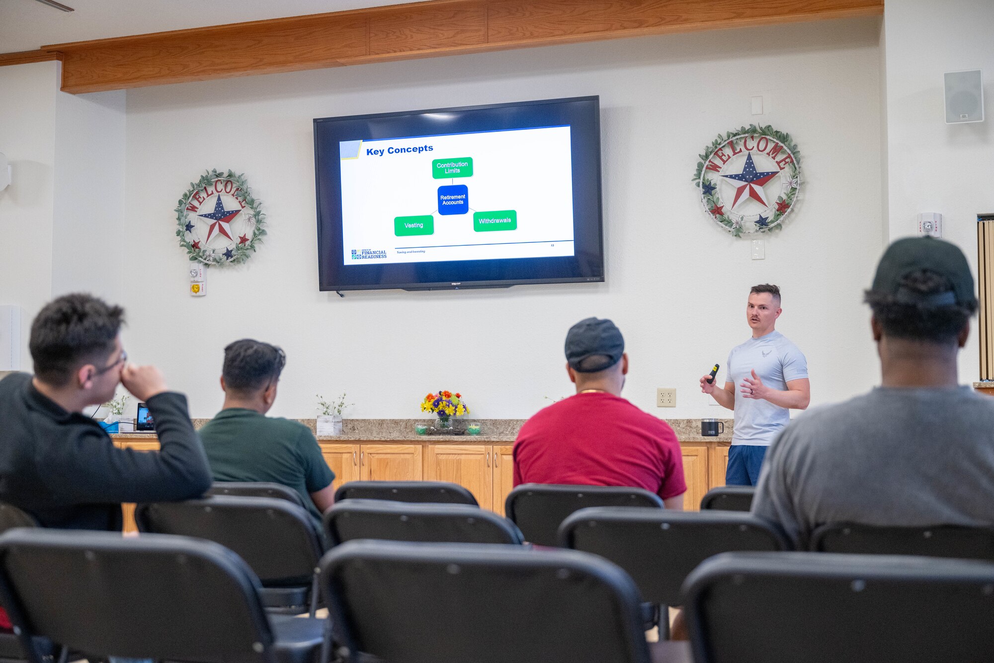 Airmen discuss personal finance during an Airmen 4 Life meeting.
