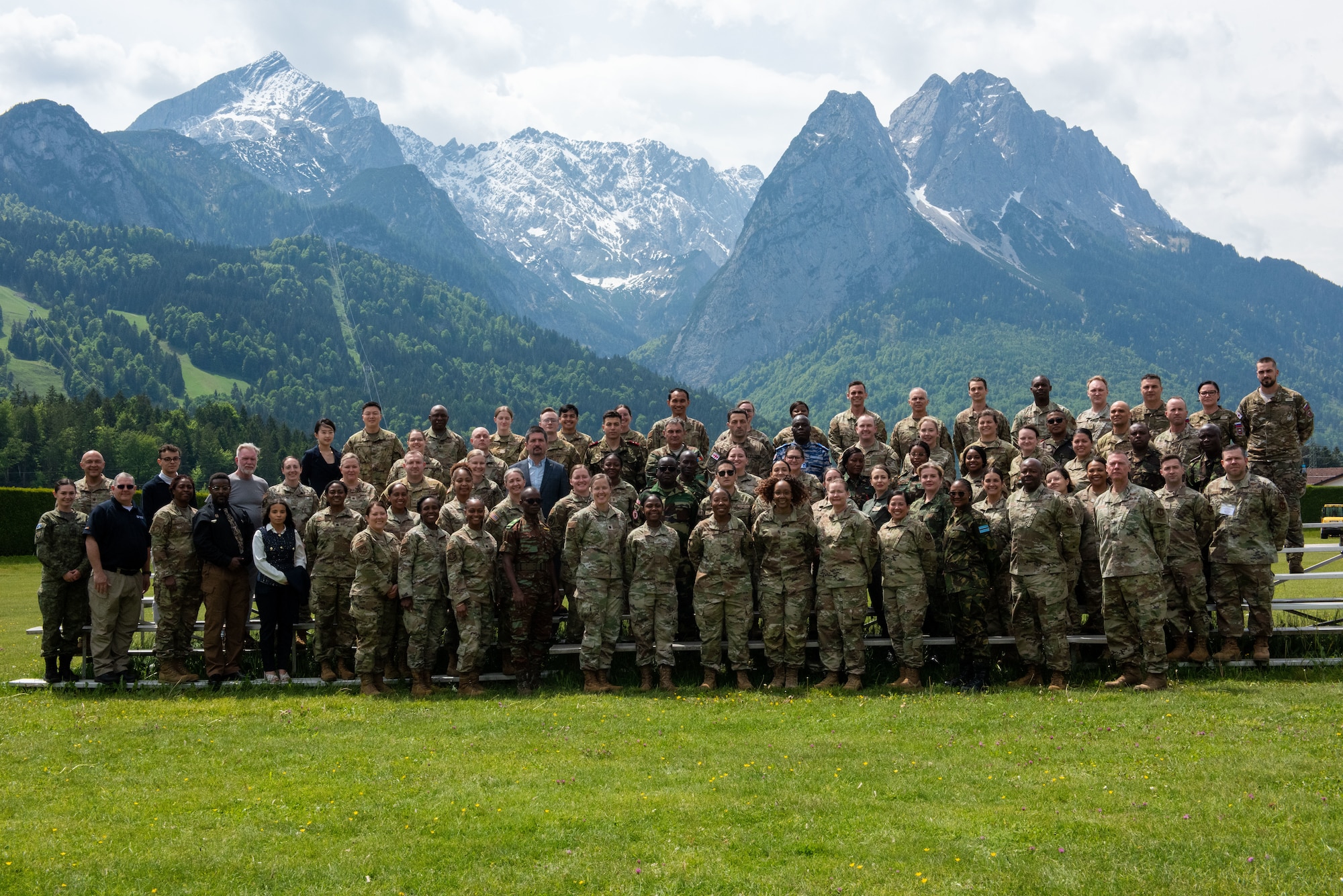 U.S. Air Force Brig. Gen. Gwendolyn Foster, 59th Medical Wing commander, asks a question during a briefing at the European-African Military Nursing Exchange conference in Garmisch-Partenkirchen, Germany, May 22, 2025. Medical professionals from various countries discussed ethics and end-of-life care on the battlefield, the role of military nursing in promoting peace and stability in unstable regions, and effective leadership strategies for military nursing officers. (U.S. Air Force photo by Airman 1st Class Jason Jones Jr.)