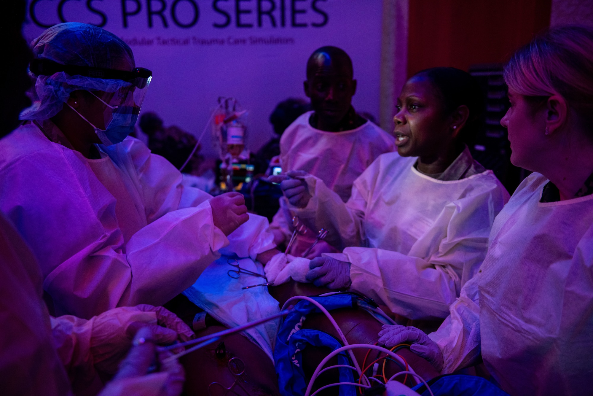 U.S. Airmen and nursing personnel from partner nations work together during a training exercise at the European-African Military Nursing Exchange conference in Garmisch-Partenkirchen, Germany, May 23, 2025. The training exercises strengthened critical hands-on skills while also enhancing collaboration and interoperability between the U.S. Air Force and its partner nations. (U.S. Air Force photo by Airman 1st Class Jason Jones Jr.)