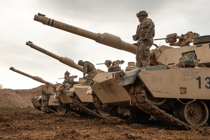 U.S. Soldiers assigned to Charlie Company, 4th Battalion, 6th Infantry Regiment, 3rd Armored Brigade Combat Team, 1st Armored Division, prepare for a live fire exercise at Novo Selo Training Area, Bulgaria, May 13, 2025. Live fire exercises ensure that Soldiers maintain their readiness and improve their lethal capabilities resulting in increased combat effectiveness when on the battlefield. (U.S. Army photo by Spc. Nathan Arellano Tlaczani)