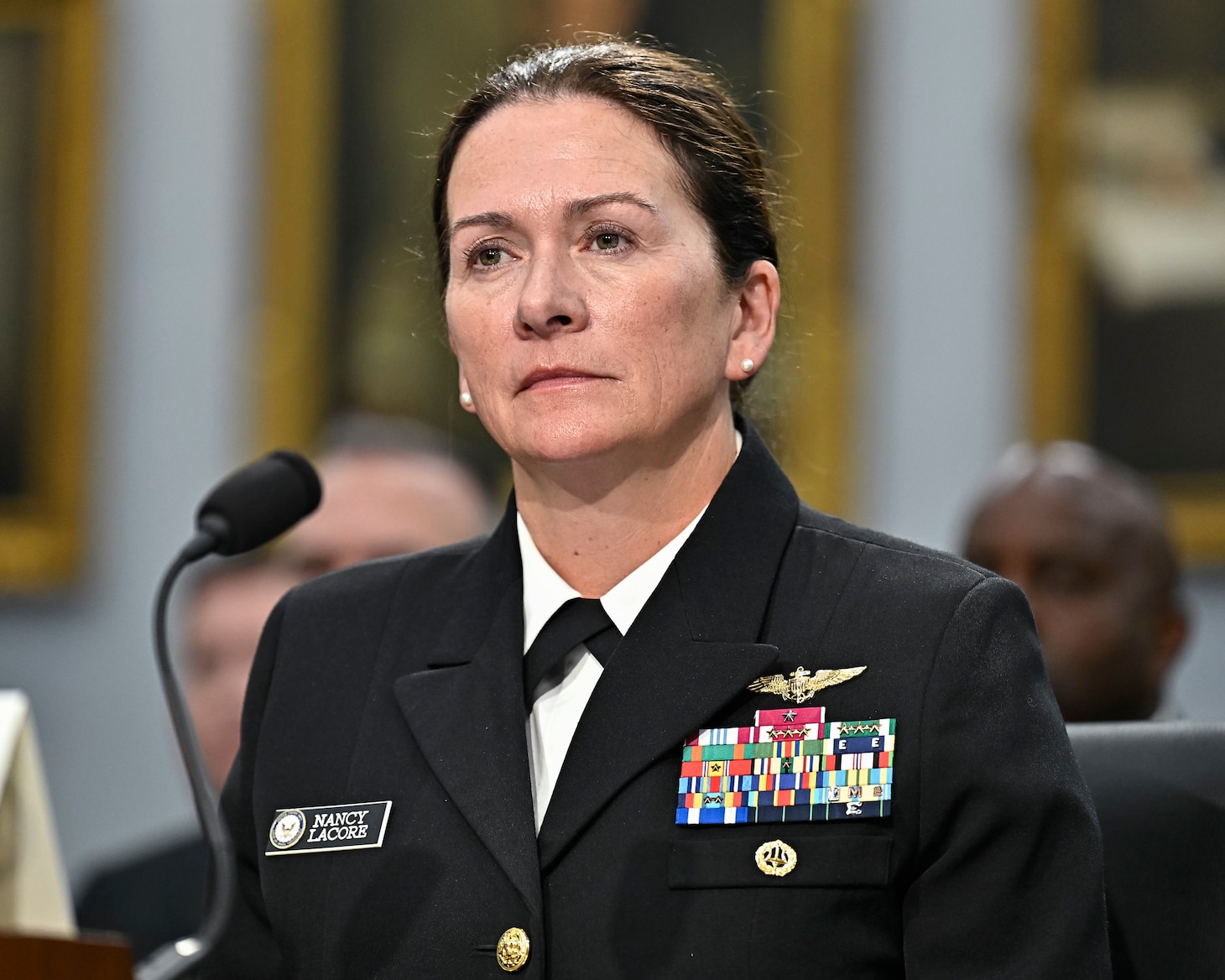 Chief of Navy Reserve Vice Adm. Nancy Lacore listens to opening remarks during a House Appropriations Committee oversight hearing on Capitol Hill in Washington, D.C., May 20, 2025. (U.S. Air Force photo by Eric Dietrich)