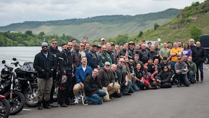 Members from the Kaiserslautern Military Community and Spangdahlem Air Base pose for a photo after participating in a mentorship ride at Bernkastel-Kues, Germany, May 27, 2025. The Ramstein mentorship ride program began in 2013 and continues to fuel riders by providing them opportunities to engage and travel across Germany with a motorcycle community. Over 60 members from the KMC and 12 members from Spangdahlem AB were in attendance, marking it the largest mentorship ride in 15 years. (U.S. Air Force photo by Senior Airman Sabrina Fuller-Judd)