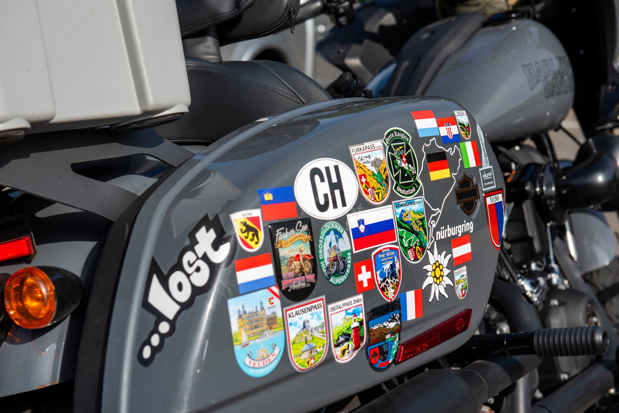 A Kaiserslautern Military Community member’s motorcycle showcases landmark stickers of places the rider has traveled to at the mentorship ride at Ramstein Air Base, Germany, May 27, 2025. The 86th Airlift Wing Safety Office incorporated motorcycle training prior to the mentorship ride to equip riders with refresher skills such as motorcycle control, hazard avoidance and situational awareness. These skills are critical to prevent accidents and minimize the severity of injuries in the event of an accident. (U.S. Air Force photo by Senior Airman Sabrina Fuller-Judd)