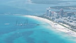 U.S. Air Force B-52H Stratofortress, B-2 Spirit and B-1B Lancer bombers led a seven-ship dissimilar bomber/fighter formation over Miami Beach, Fla., May 24, 2025, as seen in this screen capture from an Air Force Global Strike Command video published by Staff Sgt. Bailee Darbasie.