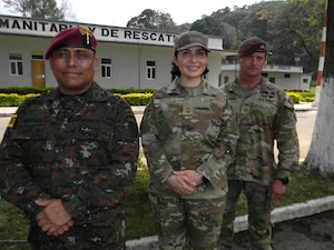 U.S. Air Force Chief Master Sgt. Karla Pelayo, from the Air Force’s Language Enabled Airman Program, poses May 21, 2025, on Mariscal Zavala military base with Col. Victor Argueta Oscal of the Guatemalan army, who commanded the combined task force in CENTCAM Guardian 2025, and U.S. Army Maj. Brian Hotchkiss, an advisor from the 1st Security Forces Assistance Brigade, for whom she interpreted daily. CENTAM Guardian, an annual, multinational exercise, fosters strong partnerships by enabling combined forces to effectively address shared security challenges. The Air Force’s Language Enabled Airman Program, to which Pelayo belongs, includes more than 3,700 service members who bridge language and cultural barriers with allies and partners to create a more interoperable, lethal force. (U.S. Navy photo by Cmdr. Michael Cody)