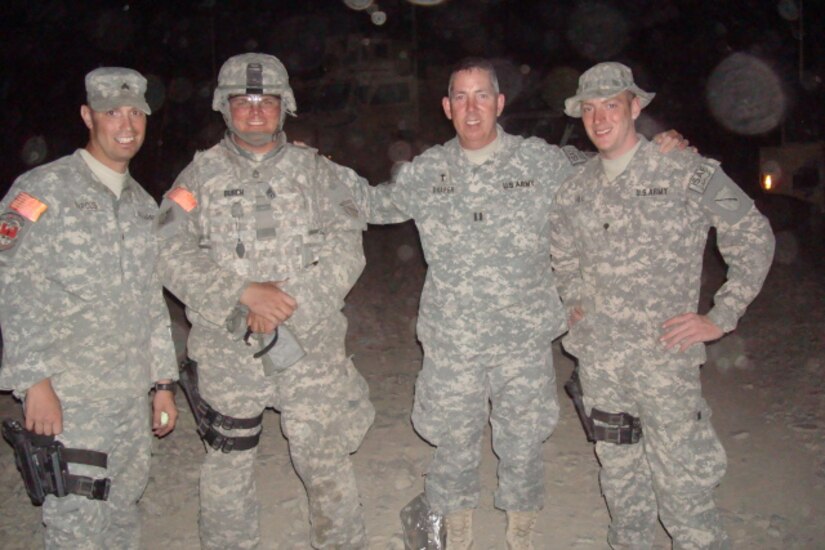 Chaplain (Cpt.) William Draper takes a photo with troops from the 201st Engineer Battalion prior to their mission while making his rounds during his deployment to Afghanistan in 2008-2009.