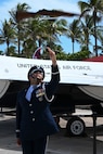 U.S. Air Force Senior Airman Wijeury Collado, U.S. Air Force Honor Guard ceremonial guardsman, performs a rifle flip at the Hyundai Air & Sea Show at Miami Beach, Fla., May 24, 2025.