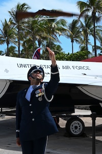 U.S. Air Force Senior Airman Wijeury Collado, U.S. Air Force Honor Guard ceremonial guardsman, performs a rifle flip at the Hyundai Air & Sea Show at Miami Beach, Fla., May 24, 2025.