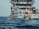 U.S. Marines with Maritime Special Purpose Force, 22nd Marine Expeditionary Unit, board a vessel in rigid-hull inflatable boats while conducting maritime interception operations aboard U.S. Navy training support vessel USNS Vindicator (TSV5) in support of Iwo Jima Amphibious Ready Group Marine Expeditionary Unit Exercise (ARGMEUEX) while underway in the Atlantic Ocean, May 18, 2025.