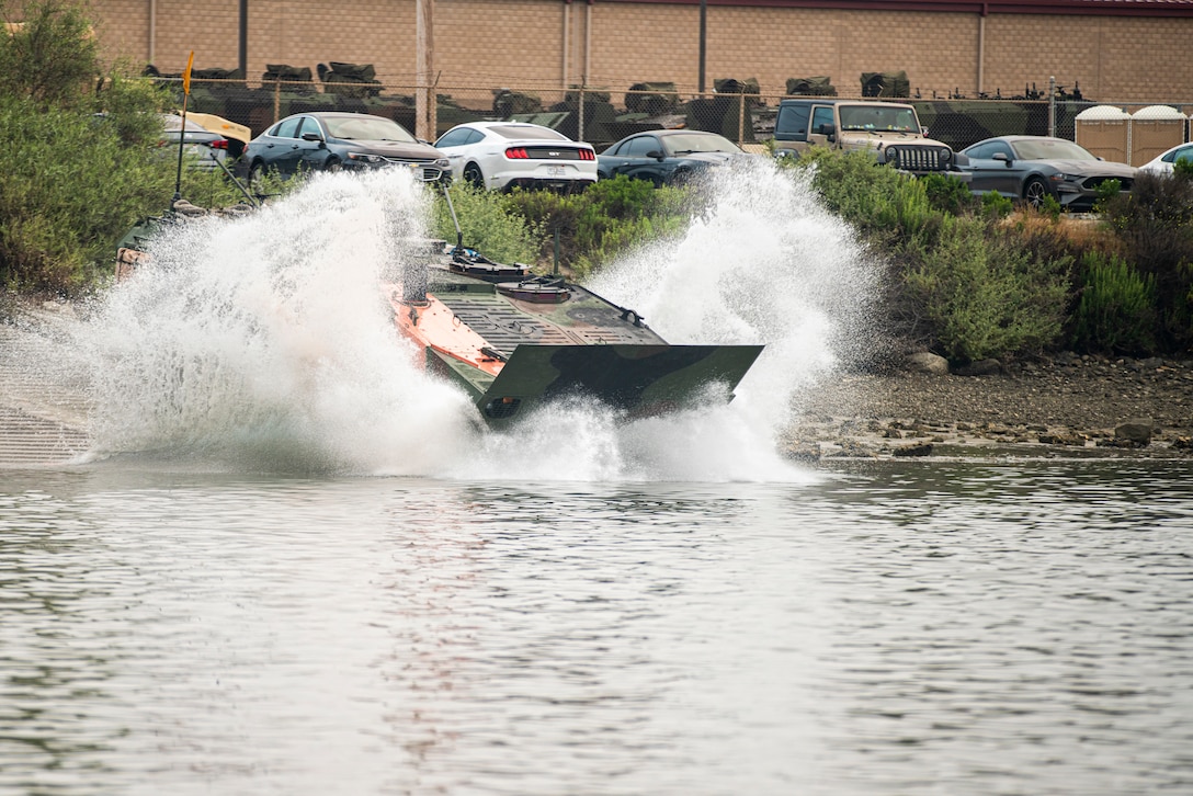 An amphibious combat vehicle with 3rd Assault Amphibian Battalion, 1st Marine Division, enters the water during Quarterly Underway Amphibious Readiness Training 25.3 at Marine Corps Base Camp Pendleton, California, May 28, 2025.