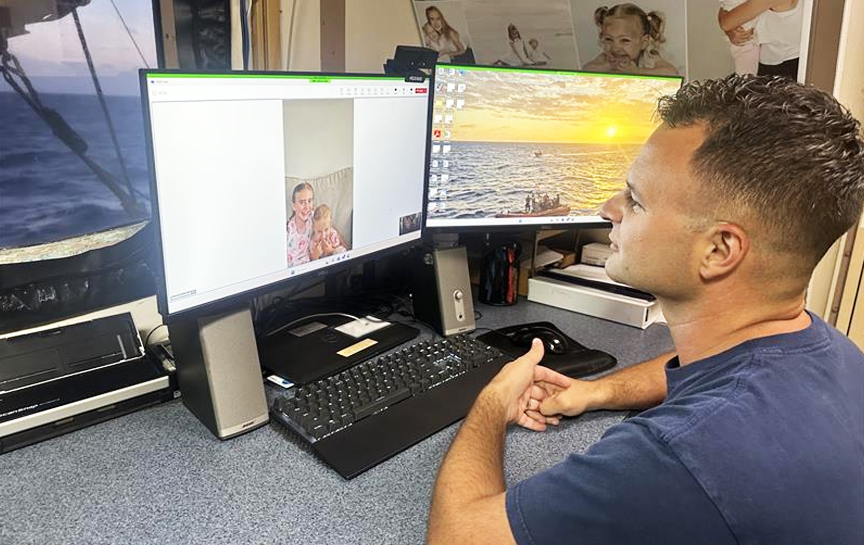 Lt. Cmdr. Ben Yahle speaks with his children while underway using new cutter connectivity technology. (U.S. Coast Guard Photo)