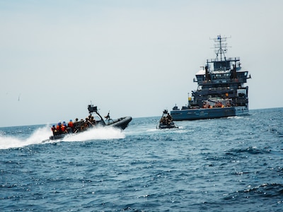 U.S. Marines with Maritime Special Purpose Force, 22nd Marine Expeditionary Unit, approach a vessel in enhanced rigid-hull inflatable boats to conduct maritime interception operations aboard U.S. Navy training support vessel USNS Vindicator (TSV5) in support of Iwo Jima Amphibious Ready Group Marine Expeditionary Unit Exercise (ARGMEUEX) while underway in the Atlantic Ocean, May 18, 2025.