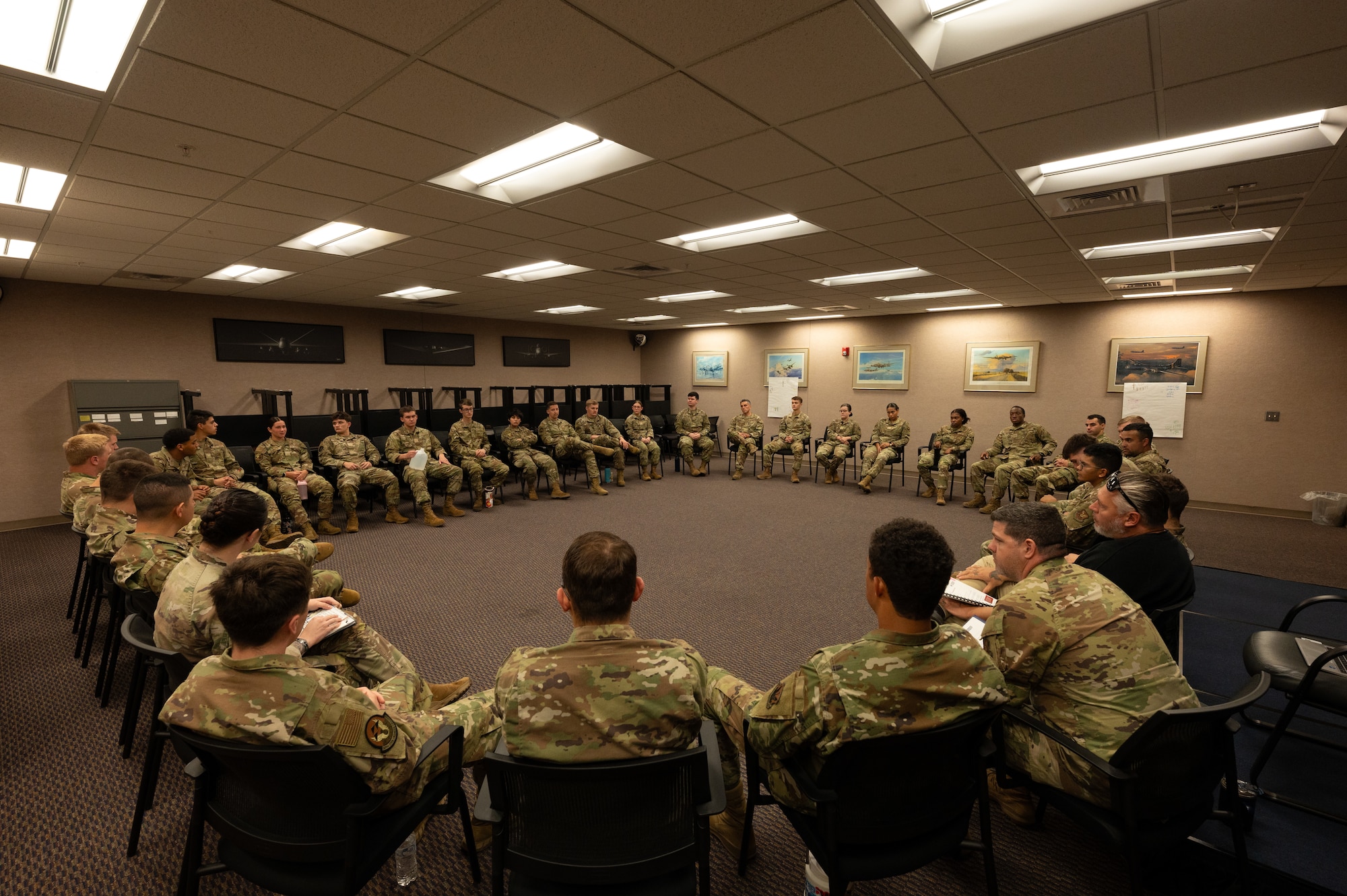 First Term Airmen gather for a Wingman Guardian Connect class at Whiteman Air Force Base, Missouri, May 13, 2025. The WGC program is designed to bolster social connections and mental health for junior enlisted Airmen at their first duty assignment. (U.S. Air Force photo by Senior Airman Joseph Garcia)